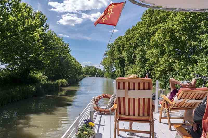 French hotel barge Athos - canal du midi France - relax on deck