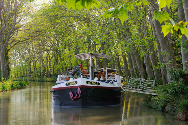 French hotel barge Athos - canal du midi France - moored