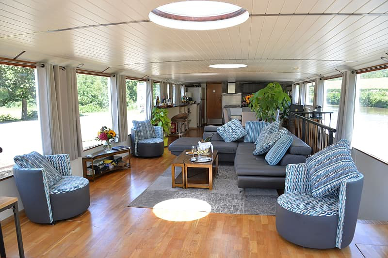 Photos : French Hotel Barge Finesse - Salon looking aft toward dining area and galley