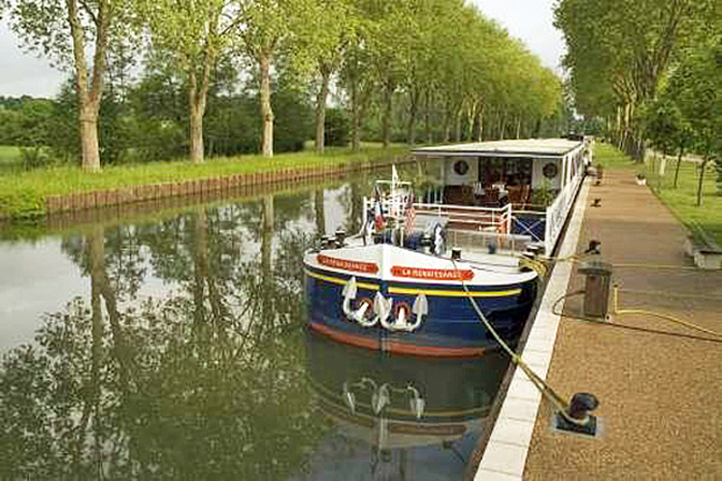 French Barge Renaissance - Moored alongside the canal. Cruising the Upper Loire and Western Burgundy regions of France